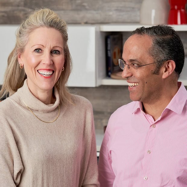 Image of two people smiling