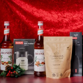 Image of Coffeelink coffee with Christmas syrups and milk frother
